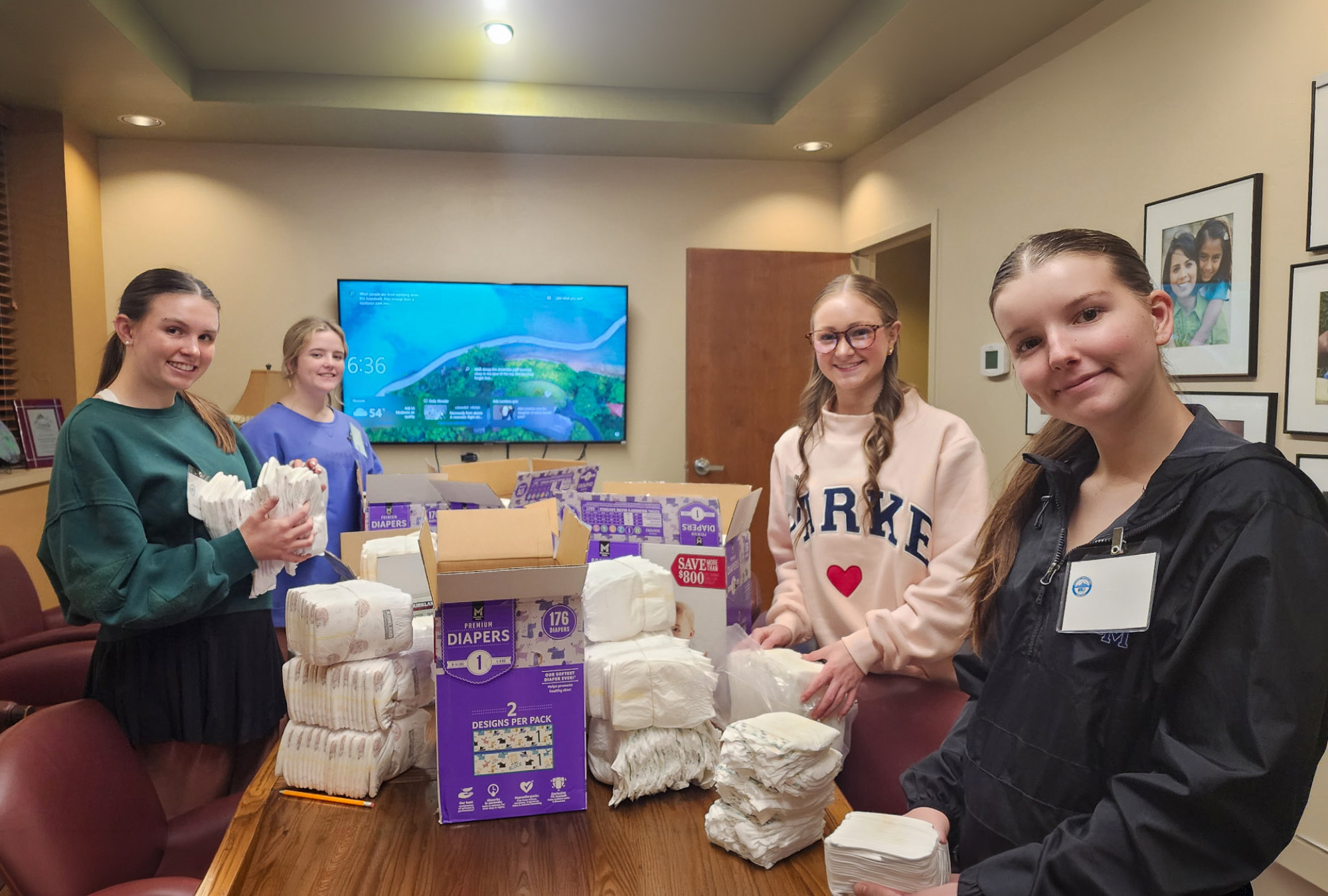 Youth organize diaper pantry