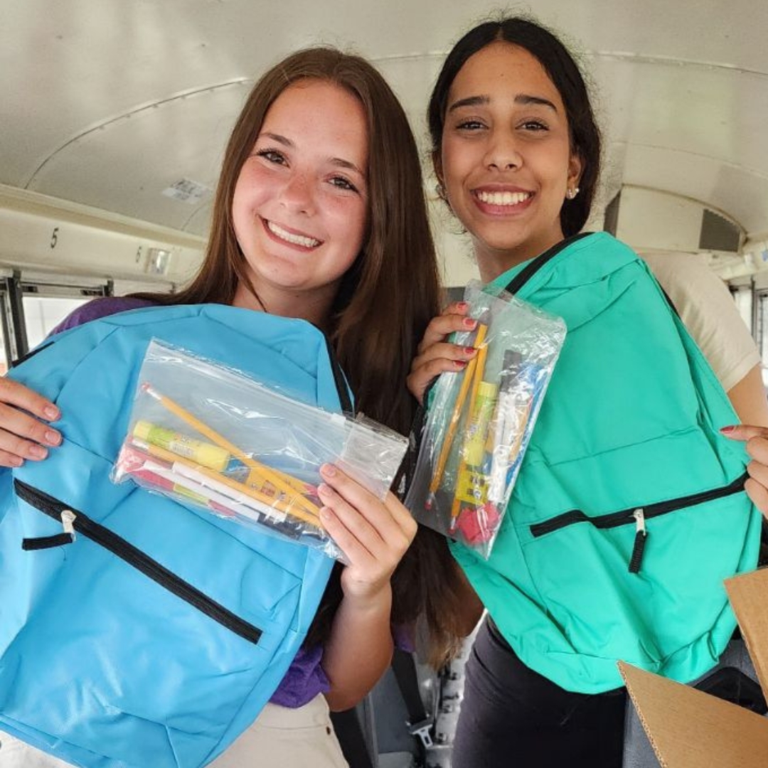 Students collect backpacks for United Way Stuff The Bus