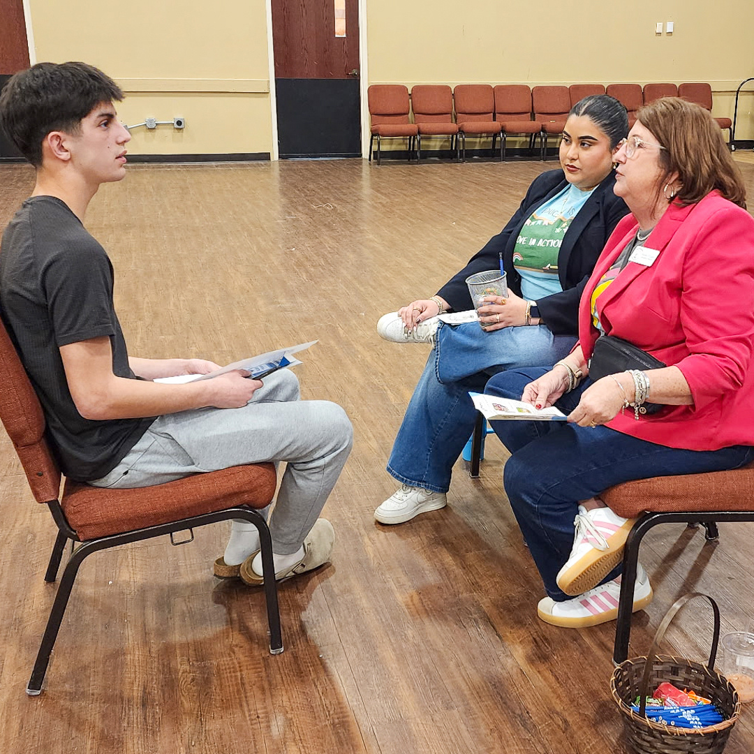 Three people speaking